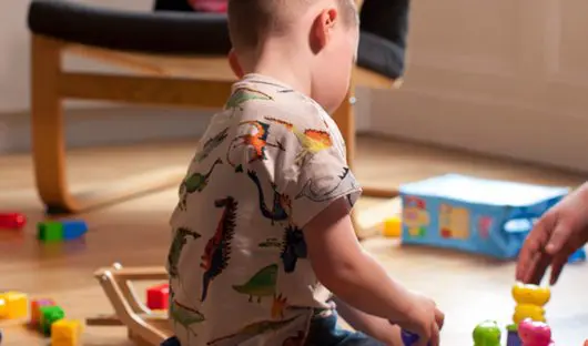 A child playing with toys