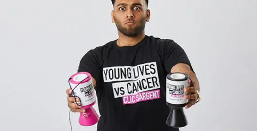 Kaiser holding CLIC Sargent collection tins