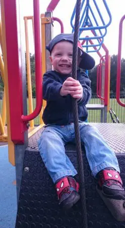 Lucien playing at a park during cancer treatment