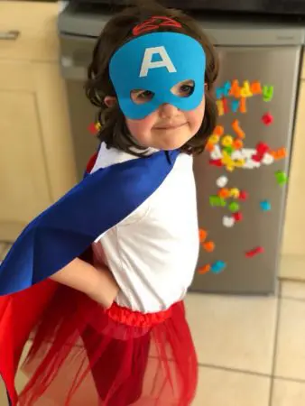Heidi dressed as a superhero