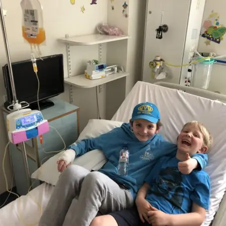 Oliver (left) and his brother Ben during Oliver's cancer treatment