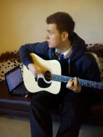 Steven playing the guitar