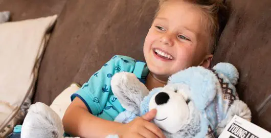 Seb with Barnaby the CLIC Sargent bear