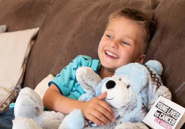 Seb with Barnaby the CLIC Sargent bear