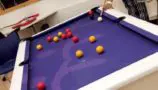 Mo playing pool in hospital