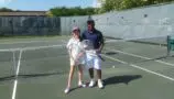 Sara with her tennis teacher - 