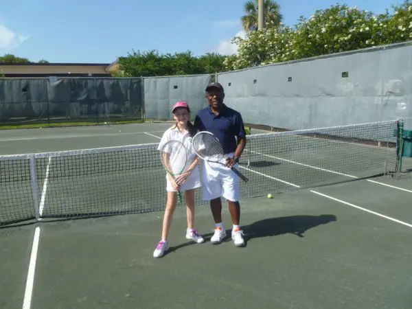 Sara with her tennis teacher - 