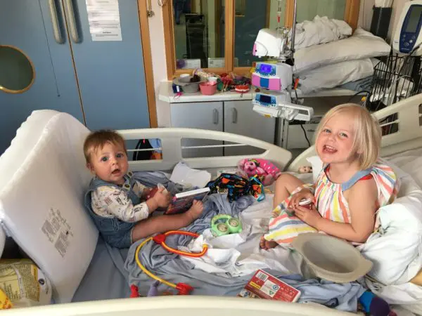 Isabel in hospital during treatment with her family.