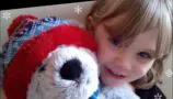 Ruby with her CLIC Sargent bear Pebbles