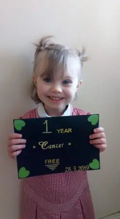 Ruby back at school after treatment. Ruby wants to be a nurse when she grows up.