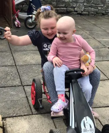 Evie and Millie seeing each other for the first time post her transplant