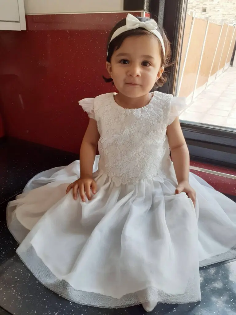 Aasiyah in a dress