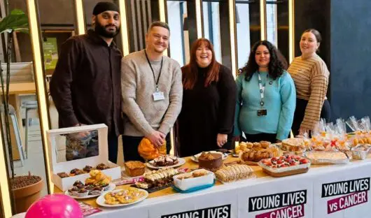 Group of people hosting a bake sale