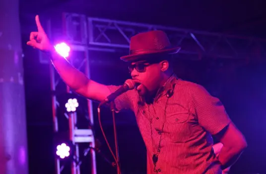 Man in a hat on stage