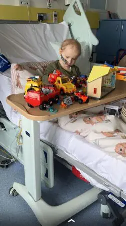 Daithi sat in his hospital bed during cancer treatment