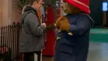 A photograph of 17 year old Jack meeting Paddington Bear