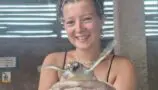 Eleanor holding a turtle