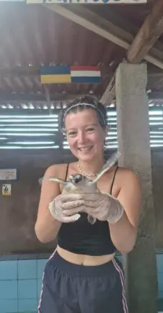 Eleanor holding a turtle