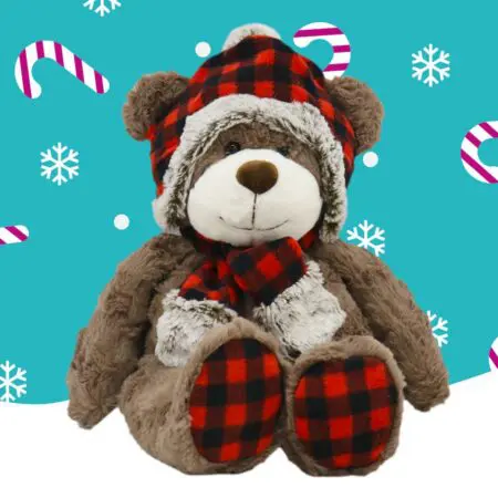 A grey bear wearing a red checked hat and scarf