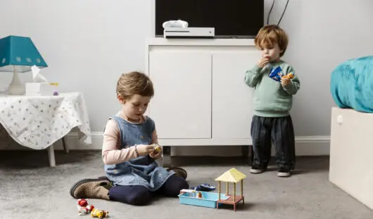 Margot and her brother playing