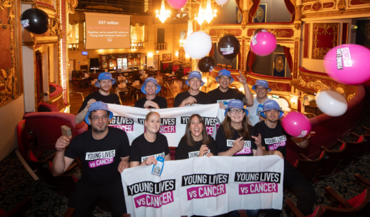 JD Wetherspoon staff celebrate raising 27 million pounds for Young Lives vs Cancer