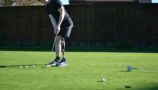 Chris, playing golf wearing his prosthetic leg