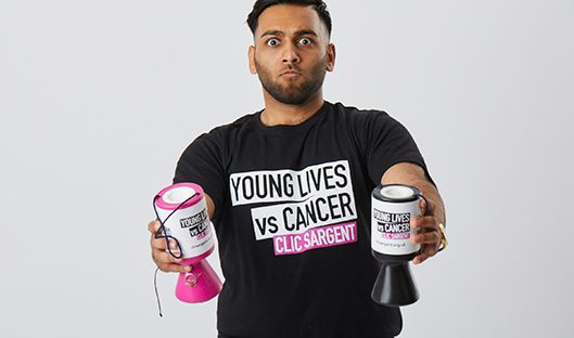 Kaiser holding CLIC Sargent collection tins