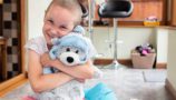 Amelia with Barnaby the CLIC Sargent bear
