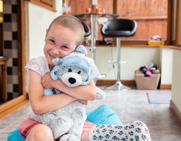 Amelia with Barnaby the CLIC Sargent bear