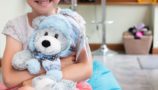 Amelia with Barnaby the CLIC Sargent bear