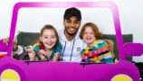 Singer Aston Merrygold met Ellie-Mae and Maisie, two children supported by CLIC Sargent, as part of Childhood Cancer Awareness Month