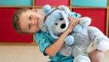 Seb with Barnaby the CLIC Sargent bear