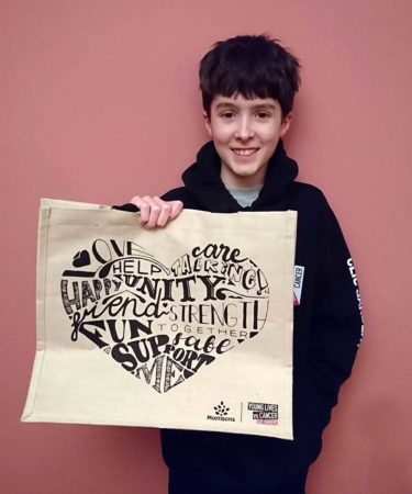 Sam helped design the Morrisons shopper bag for World Cancer Day