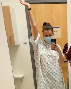 Lynsey strikes a pose in a hospital gown